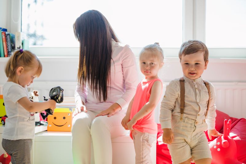 Children playing and learning in a childcare setting
